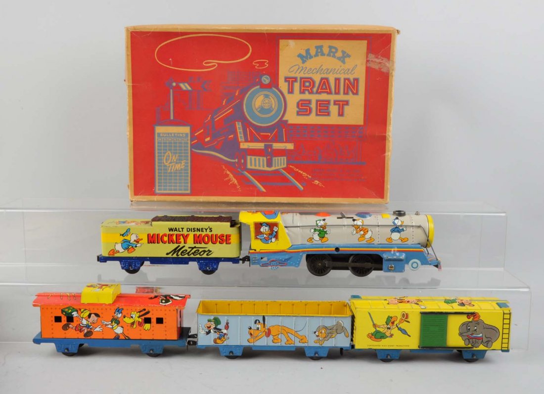 Marx Mickey Mouse Meteor Train Set.: Includes: locomotive wind - up, very attractive but missing key, excellent condition. Gondola, complete and all original but has some scratches, excellent condition. Box car, complete and all original