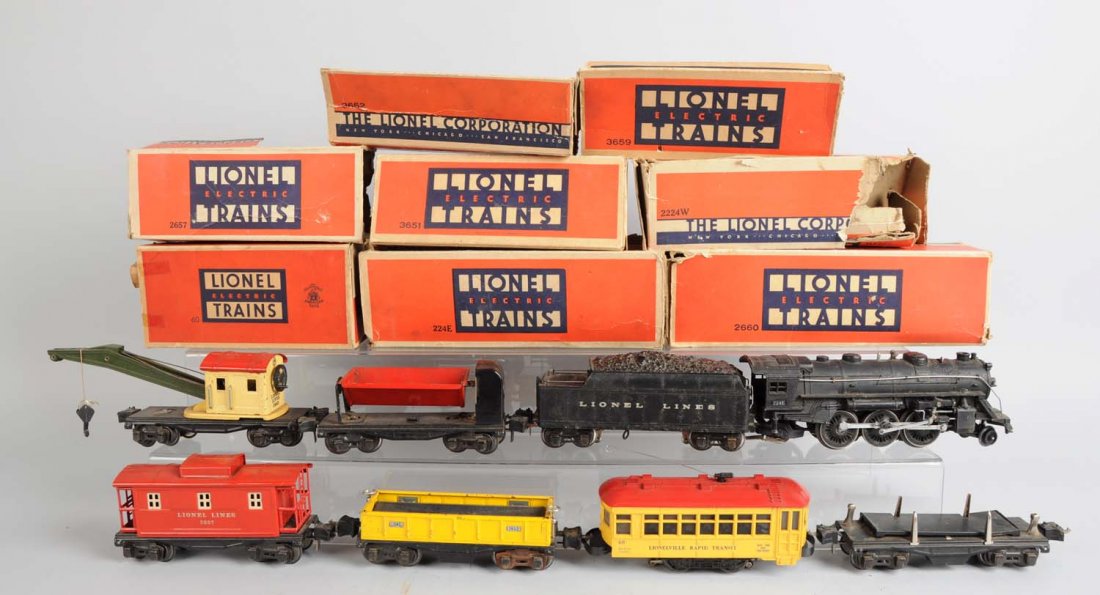 Lionel 224E Pre - War Freight Set & 60 Trolley.: Includes: 224 steam locomotive, complete, all original but has corrosion on sides, dirty and has scratches and paint chips throughout as well as rust spots, good condition with rough original box. 222