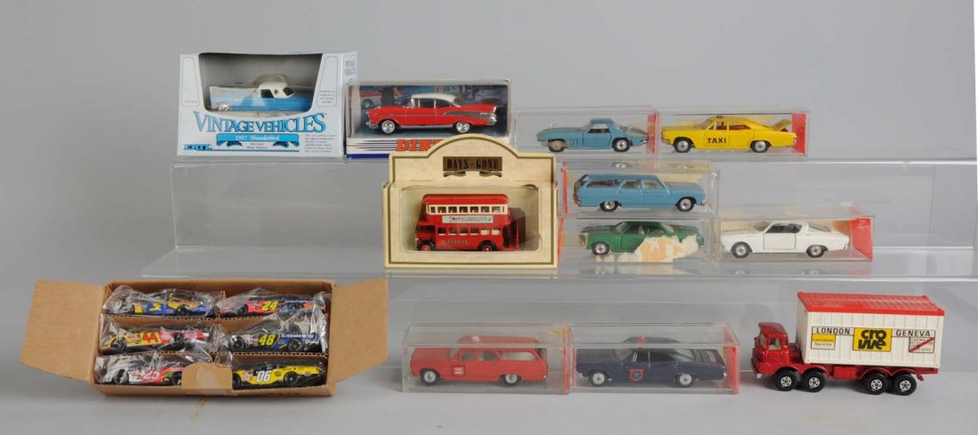 Grouping of Dinky, Cragstan, & Other Diecast Toys: The following are Cragstan diecast toys: one Corvette stingray is mint in original box; one Chevy station wagon is mint in original box; one Chevy fire chiefs car is mint in original box; one Chevy po