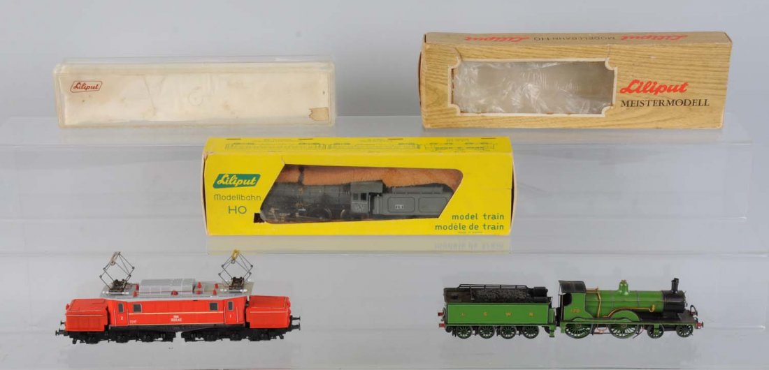 Lot Of 3: Liliput Locomotives.: 4 - 6 - 0 steam locomotive and tender, the foam in the original box has gone bad and is all over the locomotive and tender. This locomotive will need a lot of cleaning but in good condition. Liliput 4