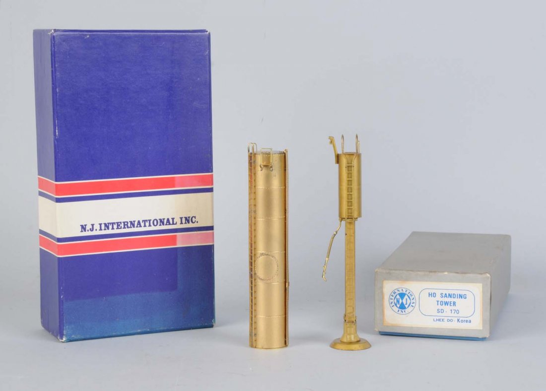 Lot of 2: NJ Intnl Brass Vert. Oil Tank & Sanding: Vertical oil tank and sanding tower. Both items are complete like new in original boxes. Condition (Near Mint).