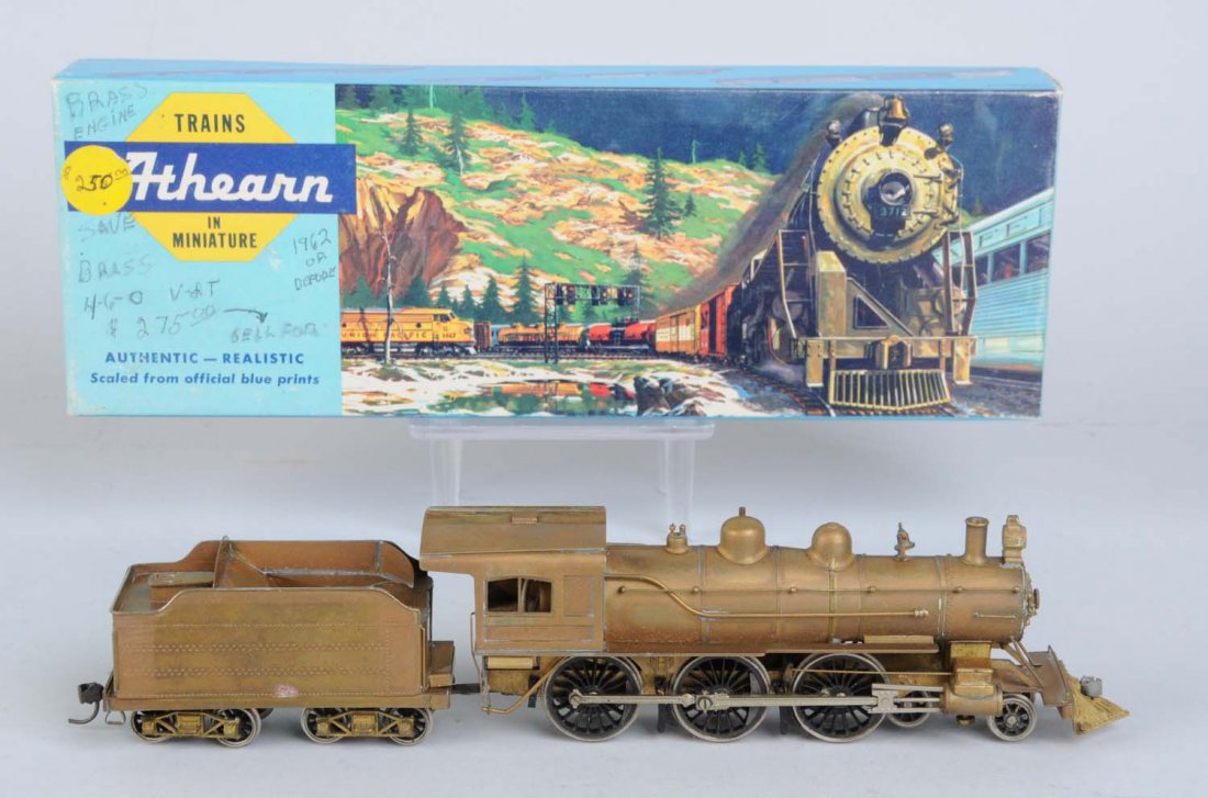 Brass HO 4 - 6 - 0 Steam Locomotive & Tender.: Unpainted. Locomotive is complete and all original, and in excellent condition. Tender has three broken steps, otherwise in excellent condition.