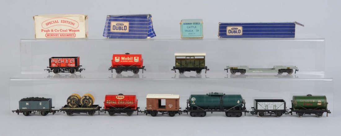 Assorted Hornby HO Rolling Stock.: One power ethyl tank car, has some scratches and paint chips but very good condition. One scar wood gondola, excellent condition. One green ici tank car, missing trim. One esso royal daylight tank car