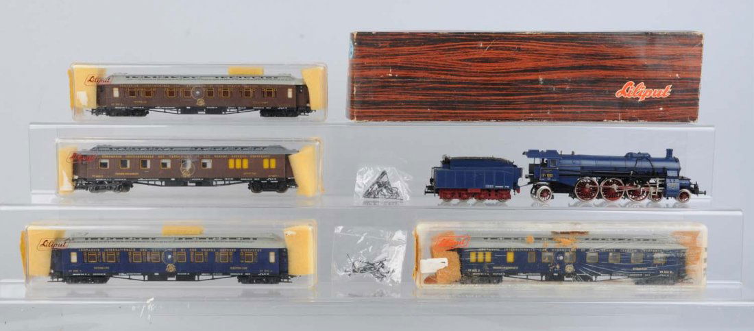 Lot of 5: Liliput 4-6-2 Loco & Passenger Cars.: Steam locomotive is complete and like new in original box. European Grande Express sleeper car like new in box. European Grande Express diner car like new in original box. Orient Express dining car li