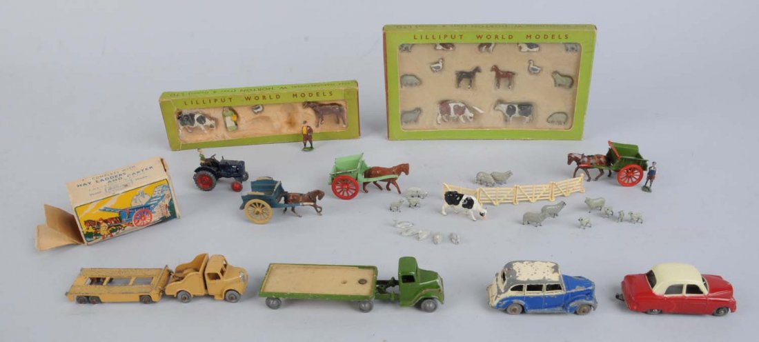 Match Box, Liliput Figures Plus.: Match box lesney gray metal wheel, red and cream sedan, Dublo Dinky Austin taxi, scratches and worn paint. One tractor trailer, two boxes of liliput figures, assorted misc items appropriate for an HO 