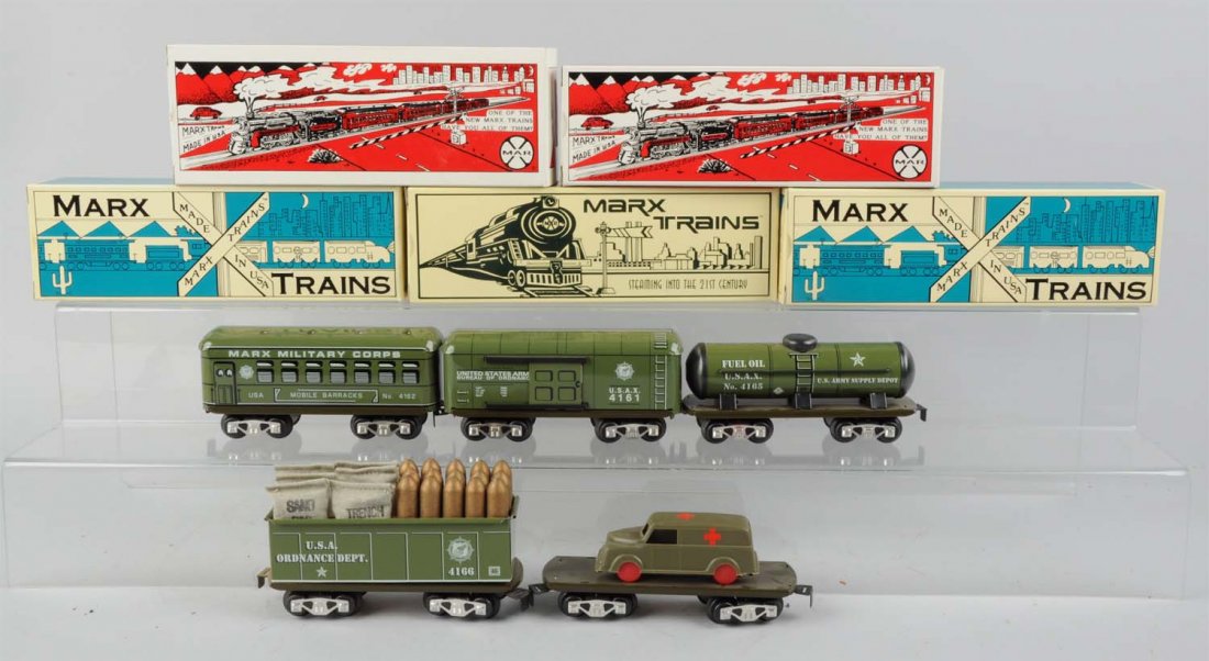 Lot of Marx Modern Era Military Trains.: Lot includes: 4184 flat car with ambulance in original box, a No.4161 6inch Military ordinance box car in original box, a No4162 Troop bunk car in original box, a No. 4166 Ammo gondola in original box