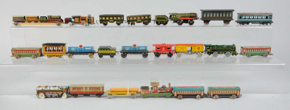 Lot of 23: Small Assorted Trains.: Includes: Ranger, Japanese tin assorted toy trains, condition. Condition (Very Good - Excellent).