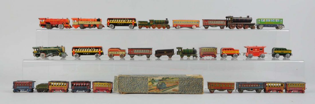 Lot of 27: Small Assorted Tin Litho Toy Trains.: Conditions vary. Condition (Good - Excellent).