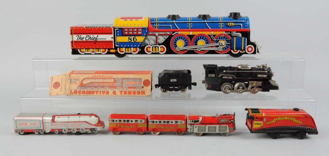 Lot of 7: Toy Trains Mostly Marx.: Lot includes: Marx No. 86 The Chief, very clean and colorful, large friction powered locomotive and tender. Complete and all original. A Marx small super chief No. 44 Streamline locomotive and tender 