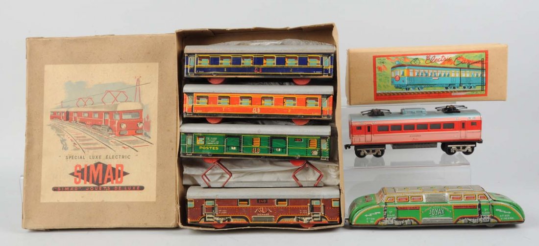 1 Japanese Tin, and 2 French Toy Train.: Includes: Joyax made in France tin litho toy train, complete and all original but has some scratches and paint chips. One Japanese tin litho Kodama toy train, complete and all original but has some ru