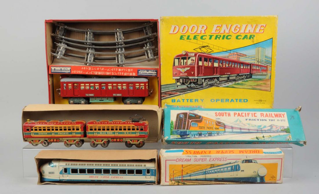 Lot of 3: Japanese Tin Toy Trains.: In original boxes. Includes: South Pacific Railway friction train, train itself is marked South Pacific Line Blue Bird Express, complete and all original and in excellent condition marked N in a trian