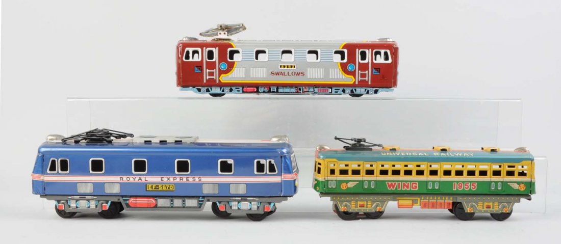 Lot of 3: Japanese Tin Litho Toy Trains.: Includes: One Royal Express by Daiya made in Japan, friction, this toy is complete and all original. A Universal Railway car Wing 1955, friction drive, marked made in Japan, makers mark is San Marusan