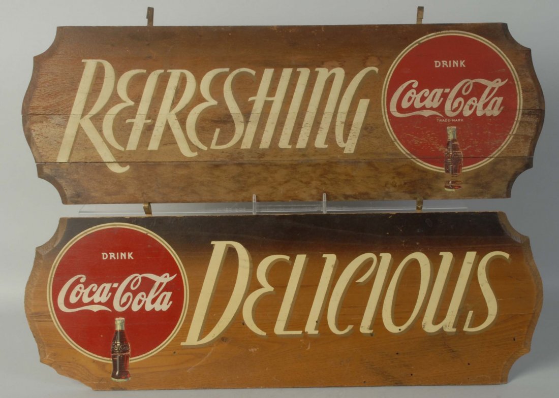 Lot of 2: 1940s Coca-Cola Wooden Kay Signs.: No metal connectors and wear. Condition (Very Good). Size Each: 24" L.
