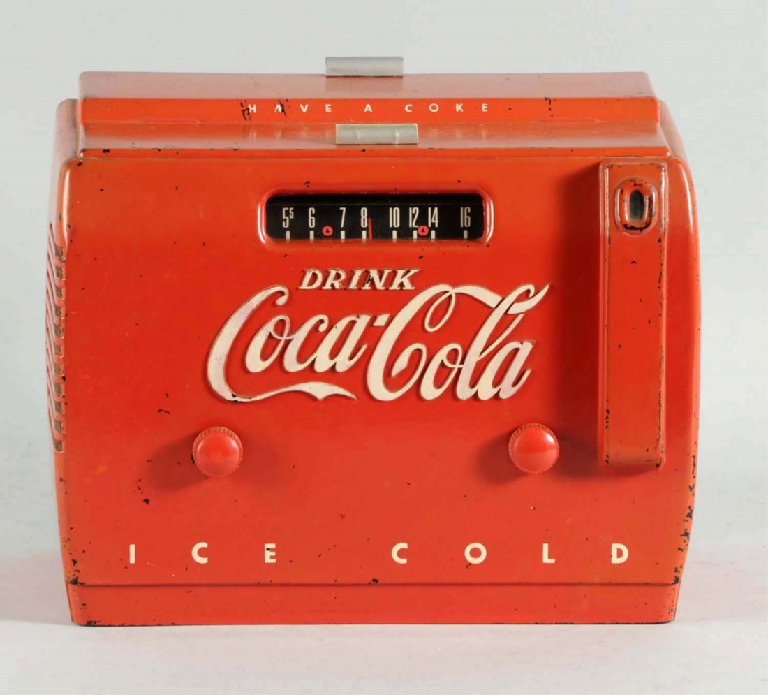 1950s Coca-Cola Cooler Radio.: Heavier over all scratches, chips, and wear. Also has some slight over all fading. Condition (Good - Very Good). Size 12" L.
