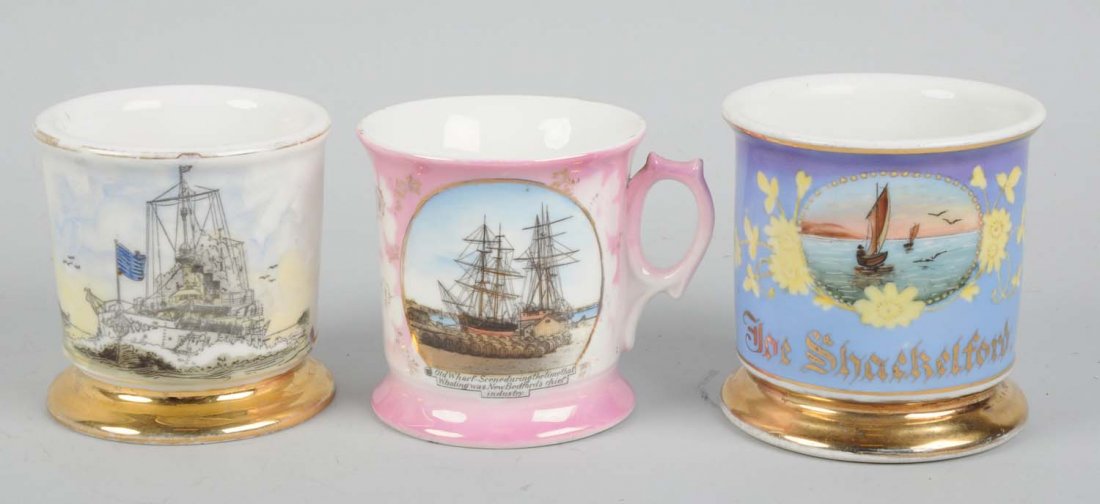 Lot of 3: Shaving Mugs.: This lot includes mugs depicting a battle ship, a tall sailing ship and a sail boat. Minor wear. Condition (Very Good Plus). Size Largest: 4" T.
