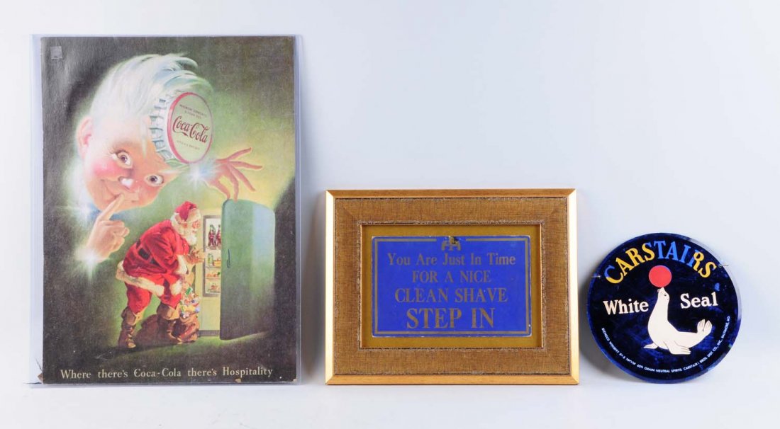 Lot of 3: Advertising Pieces.: This lot includes a cardboard Coca-Cola poster featuring Sprite boy and Santa. Also included is a cardboard barber shop sign advertising "Nice clean shaves". Last is a Carstairs White Seal Whiskey gla