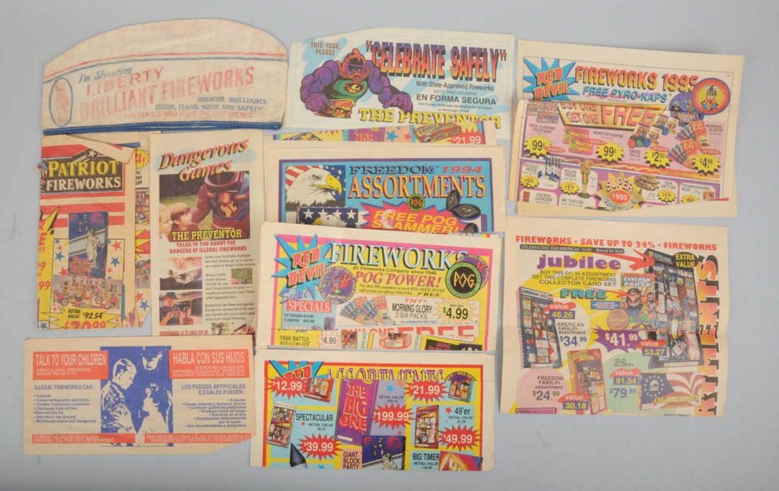 Lot Of Fireworks Ads and Cloth Cap.: This lot includes a cloth Liberty Fireworks advertising cloth cap with overall fading and a group of modern fireworks advertisements. Condition (Very Good Plus). Size Largest: 11 - 1/4" L.