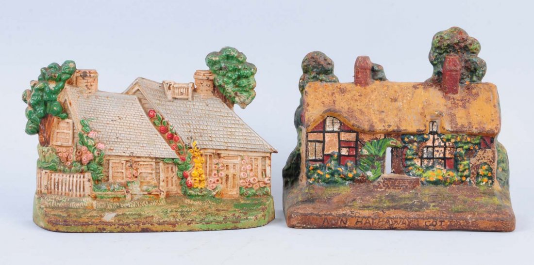 Lot of 2: Cast Iron Cottage Doorstops.: Includes – Cape Cod Cottage, Hubley; Ann Hathaway Cottage, Greenblatt. Condition (Good). Size Largest: 8" L.