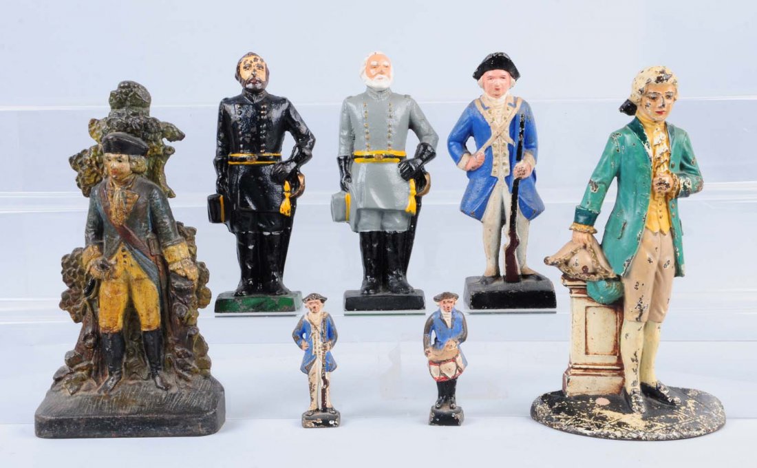 Lot Of 7: Cast Iron Doorstops & Paperweights.: Includes five doorstops – Colonial Lawyer, Waverly Studios; Minute Man, Albany; three John Wright Civil War Soldiers; two John Wright paperweights – Drummer and Infantry Soldiers. Assorted. Condit