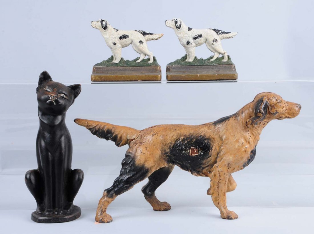 Lot of 3: Cast Iron Assorted Dog & Cat Doorstops.: Includes: Hubley deco cat; Hubley setter; and pair of B&H setter bookends. Condition (Good - Very Good). Size Tallest: 10 - 1/4".