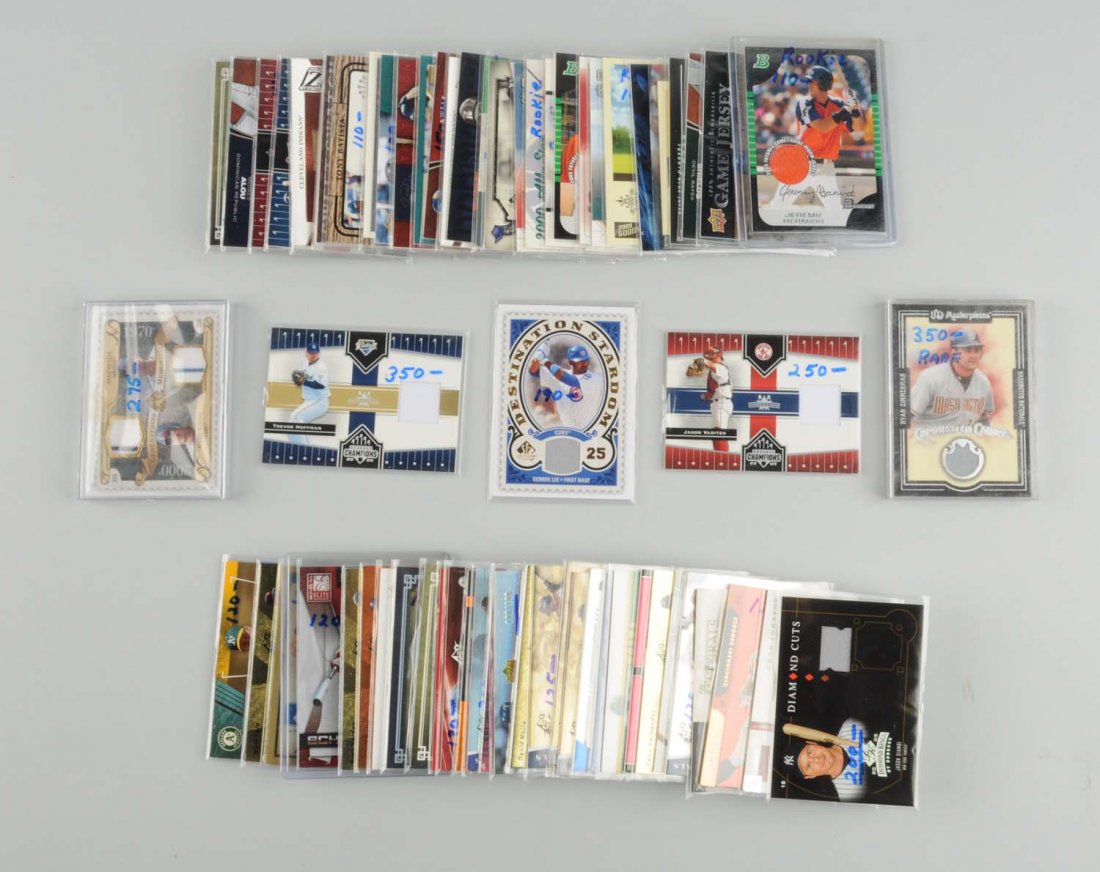 Approx. 65 Contemporary Jersey & Bat Insert Cards: Most baseball, some football. Mostly from the 2004 - 2007 years. A lot of rookies, name players such as Chad Johnson, Jason Giambi, Adrian Gonzalez, Derek Lee, Brett Myers, Joe Mauer, and many others.
