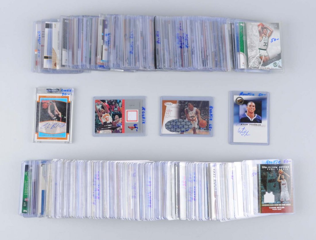 Approx 150 NBA Jersey & Signature Cards.: Mostly from 2004 season. There is a rookie Andrei Kirilenko jersey card, a Jermaine O'neal jersey card, a double scoring threats card with Ray Allen and Mike Bibby, luxury box Larry Bird card, Chris K