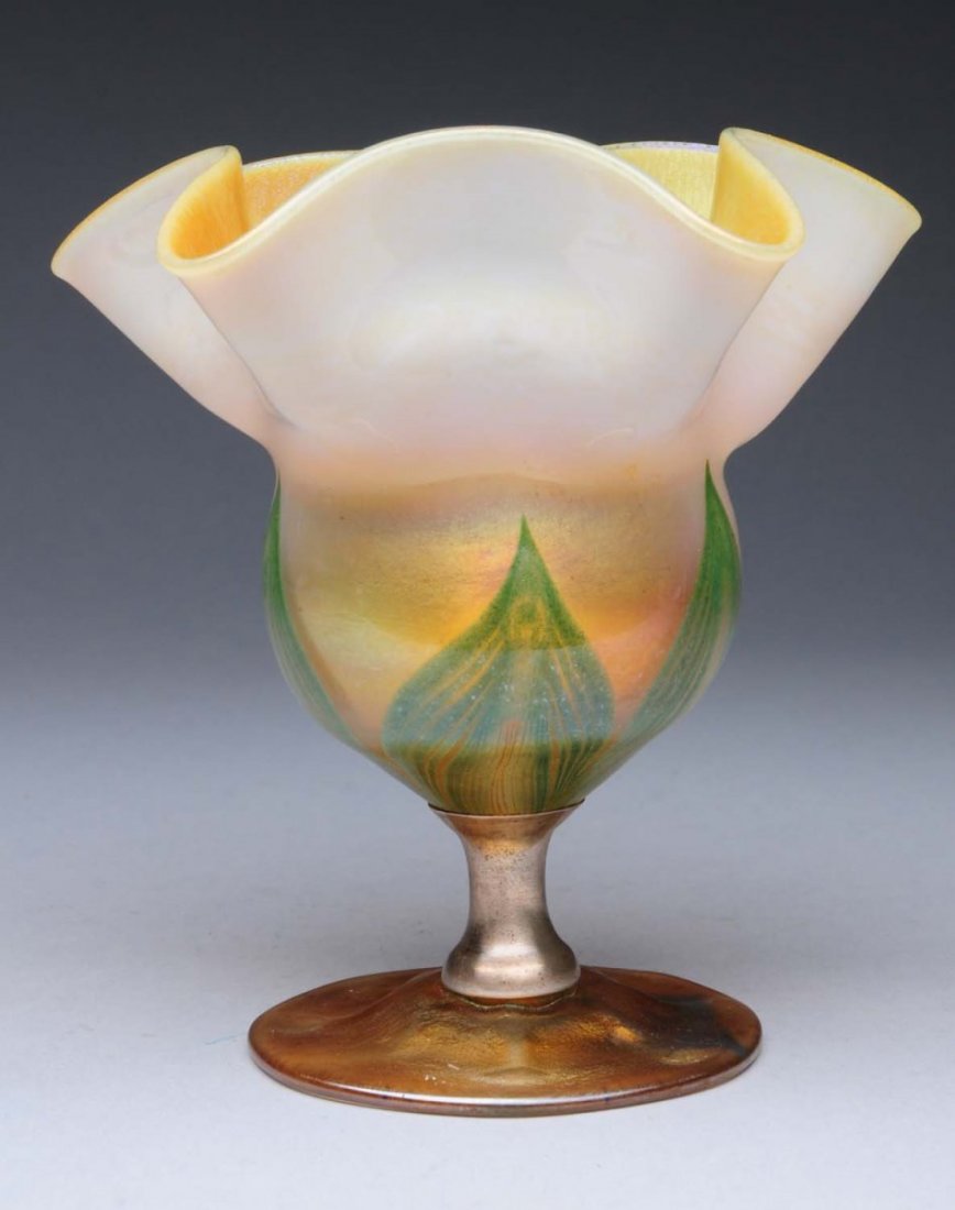 Tiffany Favrile Vase.: Tiffany Favrile Vase with pulled feather decoration and gold interior. Old Silver collar repair to stem. Condition (Good). Size 4 - 1/2" x 5".