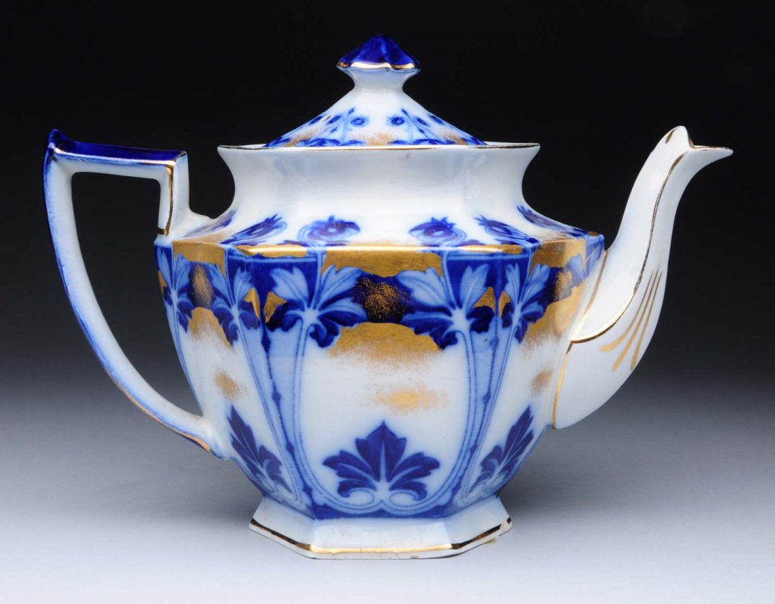 Flow Blue Teapot.: Flow Blue Teapot signed Burleigh Ware England Artois Pattern by B&L. Condition (Very Good). Size 7" T.
