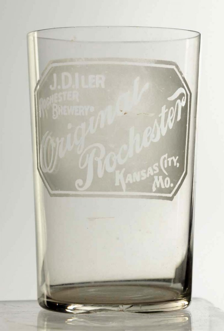 J.D. Iler Rochester Brewery Acid Etched Glass.: Kansas City, Missouri. Some minor wear to image and one larger crack on bottom base. Condition (Very Good). Size 3 - 3/4" T.