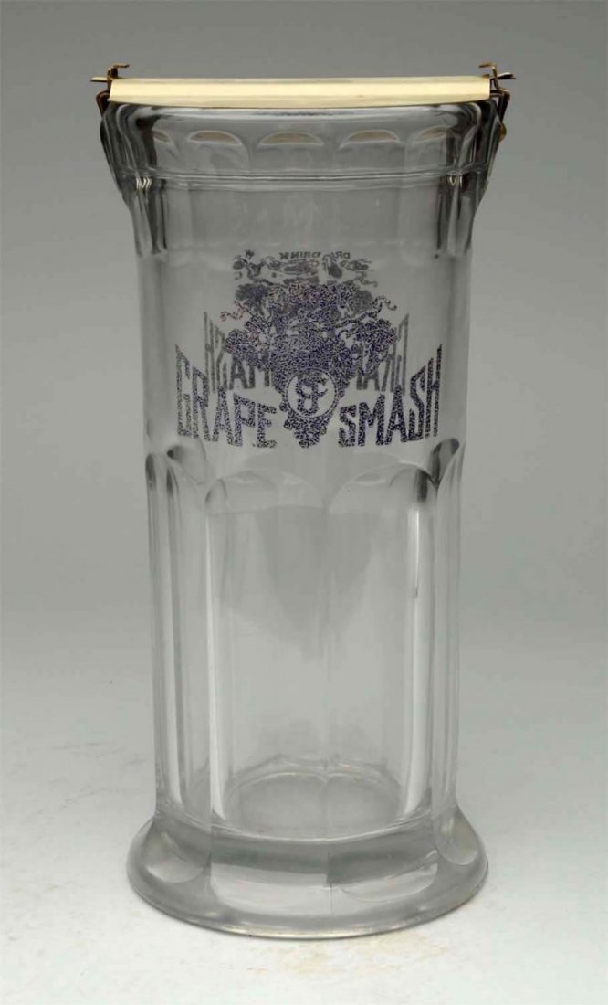 Early Grape Smash Fluted Glass Straw Holder.: A great piece and is rarely found, and still includes its original two-piece lid. Both sides are nicely decorated with an enameled Grape Smash logo. Condition is very strong with no wear noted. Condit