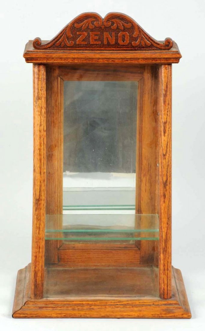 1905-1915 Zeno Gum Petite Oak Showcase.: Finish is worn or removed, but displays well as it is and has only light overall wear. Complete with its old marquee top. Condition (Very Good Plus - Excellent). Size 17 - 3/4" T.