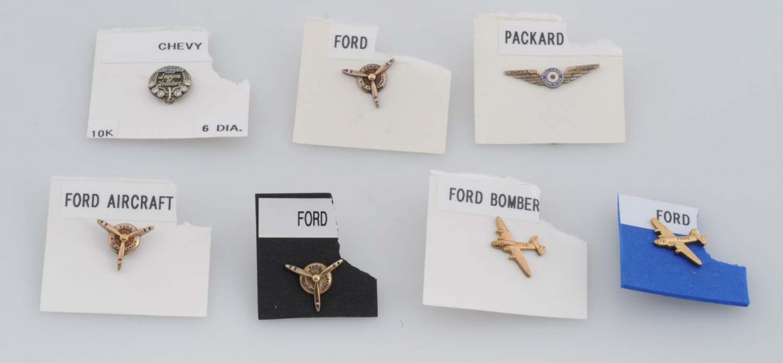 Lot of 7: Automotive Related Pins.: Includes Chevy, Packard and five Ford pins. Chevy pin is 10K gold and has six tiny diamonds. All in good condition. Size Largest: 3/4" L.