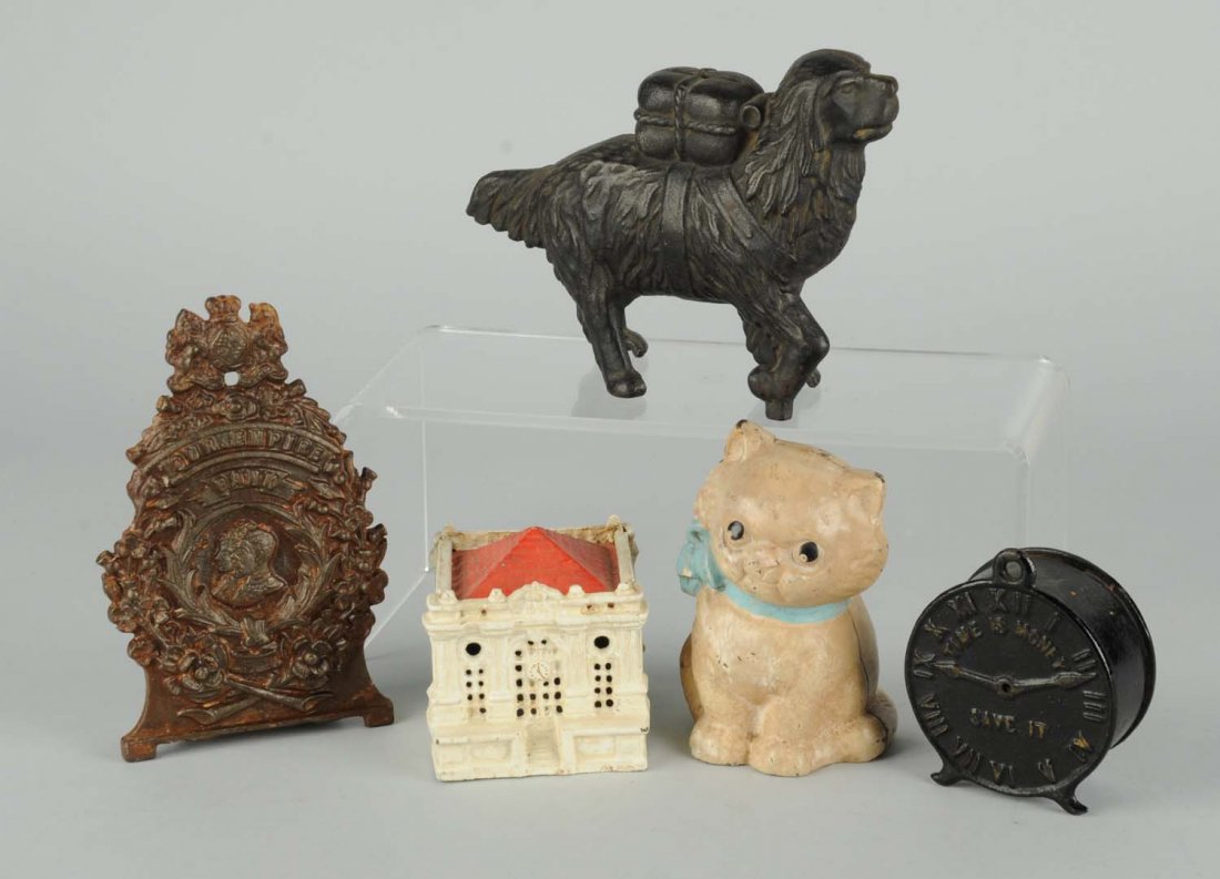 Lot Of 5: Miscellaneous Vintage Cast Iron Banks.: Different figural banks including "Time is Money", St. Bernard dog with tack, Hubley cat, small building bank, and English "Our Empire" bank. Condition (Very Good). Size Largest: 6 - 1/2" T.