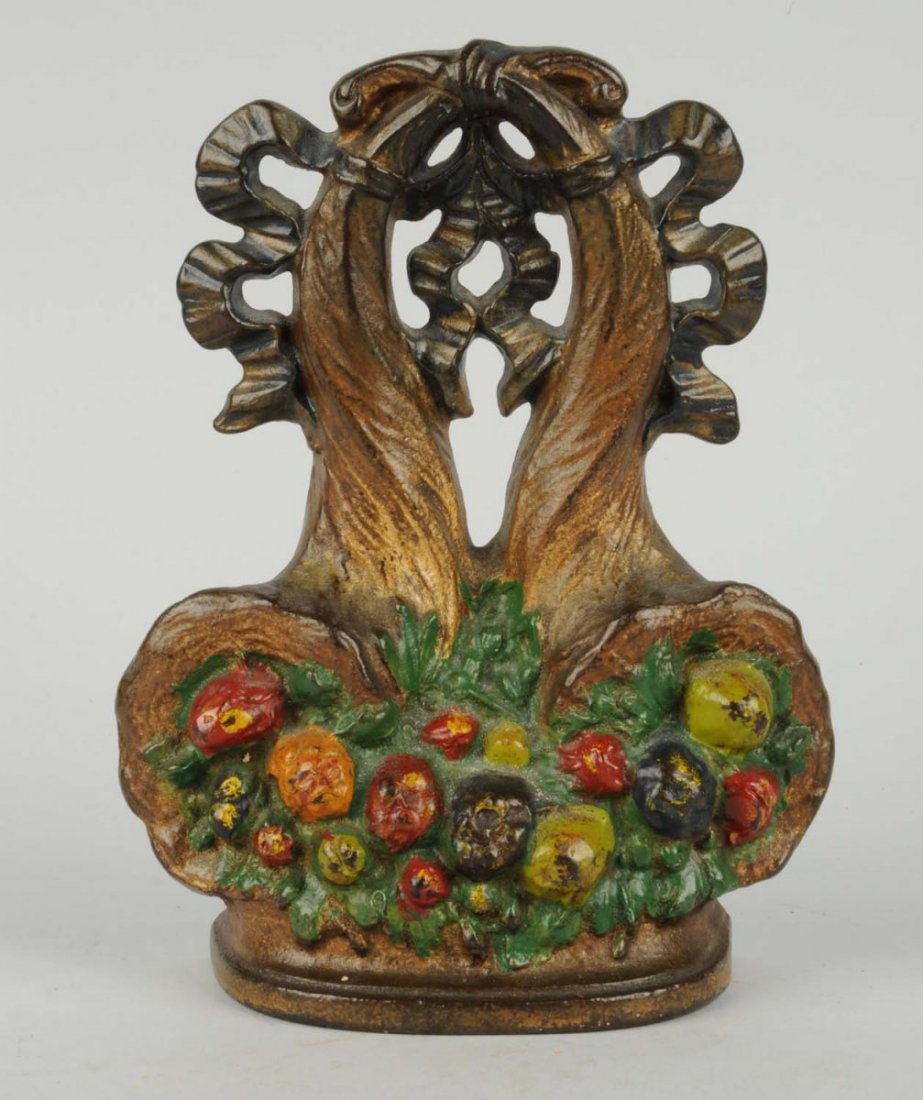 Cast Iron Double Cornucopia Doorstop.: Hubley, “182”. Condition (Very Good). Size 8 - 3/8" T.