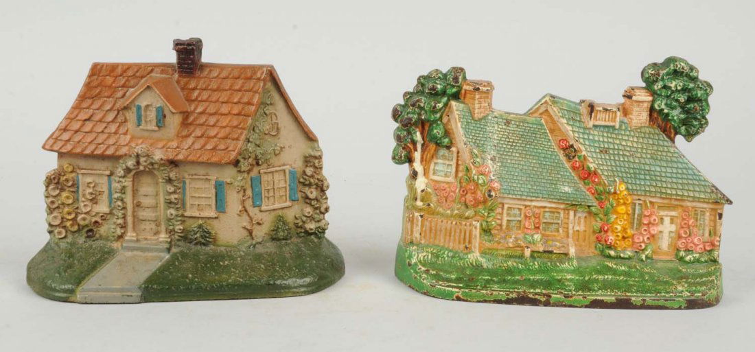 Lot Of 2 : Cast Iron Assorted Cottage Doorstops.: Includes two Cape Cod Cottages, Hubley. Condition (Very Good). Size Largest: 7 - 1/2" L.