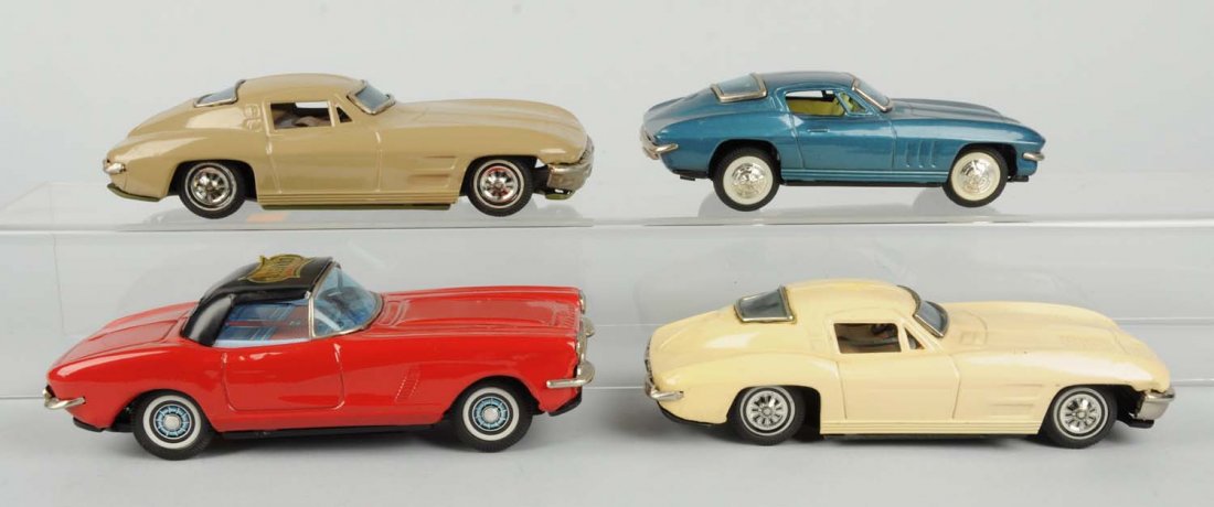 Lot of 4: Jap. Tin Litho Corvette Toys.: Two are friction and two are battery - operated. The smaller battery - operated one is missing the battery door on the bottom, marked 1967 on the back license plate. Another one has a label on the roo