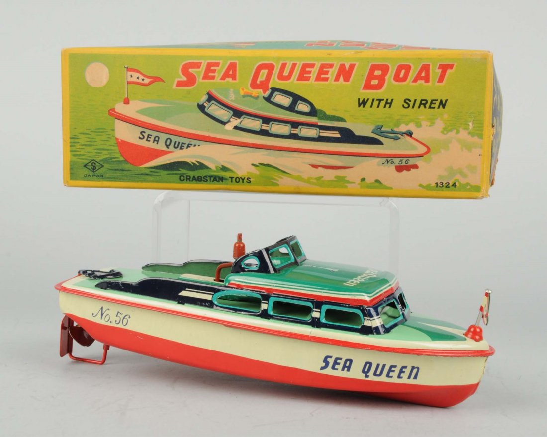 Japanese Tin Litho Friction Sea Queen Boat.: Marked No. 56 on sides. Operated by crank. Very colorful original box. Condition (Excellent). Size Box: 10 - 1/4" L.