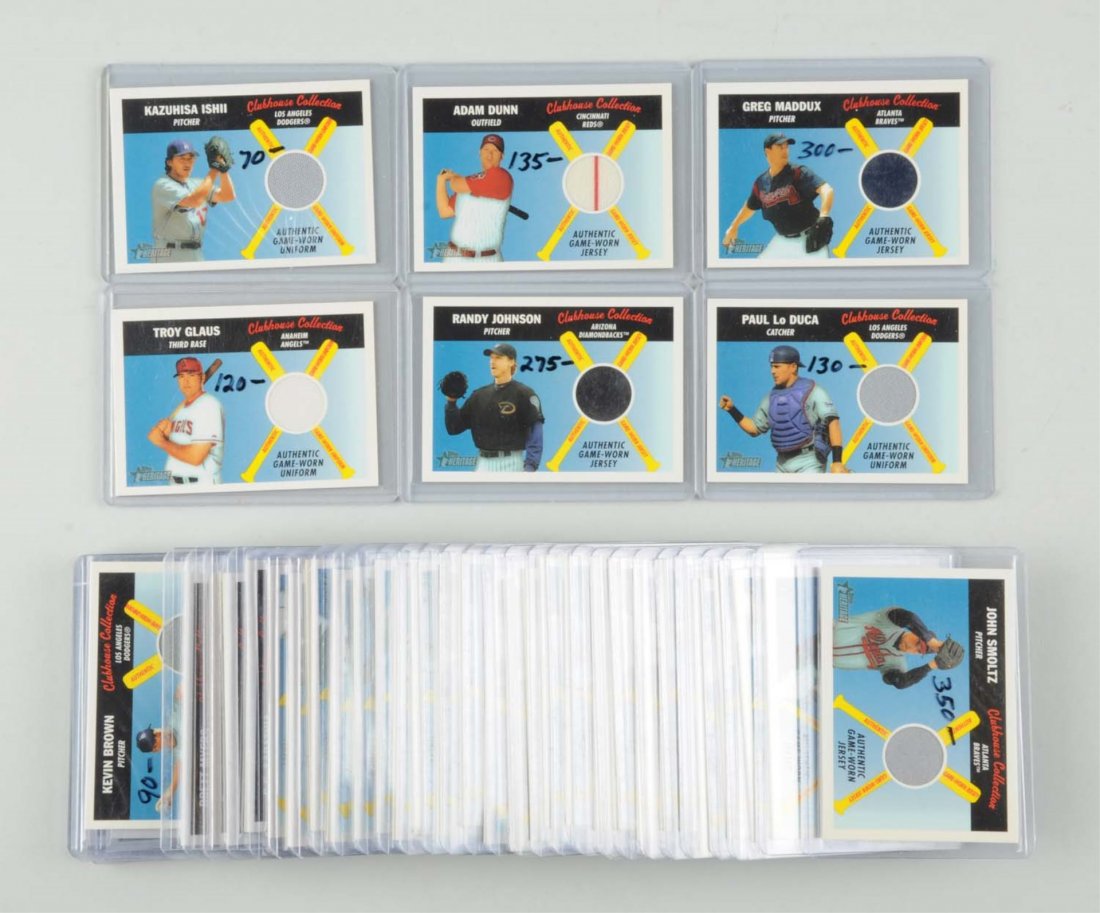 Lot Of 39: Clubhouse Col. Topps Jersey Cards.: Looks to be complete other than missing Mickey Mantle card. Includes star players and some not presently playing such as Randy Johnson, John Smoltz, and many others. Condition (Very Good - Excellent).