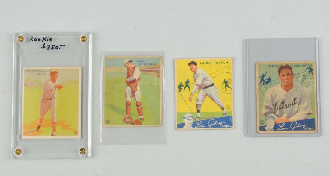 Lot Of 4: Pre-War Goudey Baseball Cards.: Circa 1930's. Two are from the Lou Gehrig Says series, one is Henry (Hank) Greenberg and the second is Larry French. There is a 1933 Paul Richards that has some pencil writing on the front and a rooki