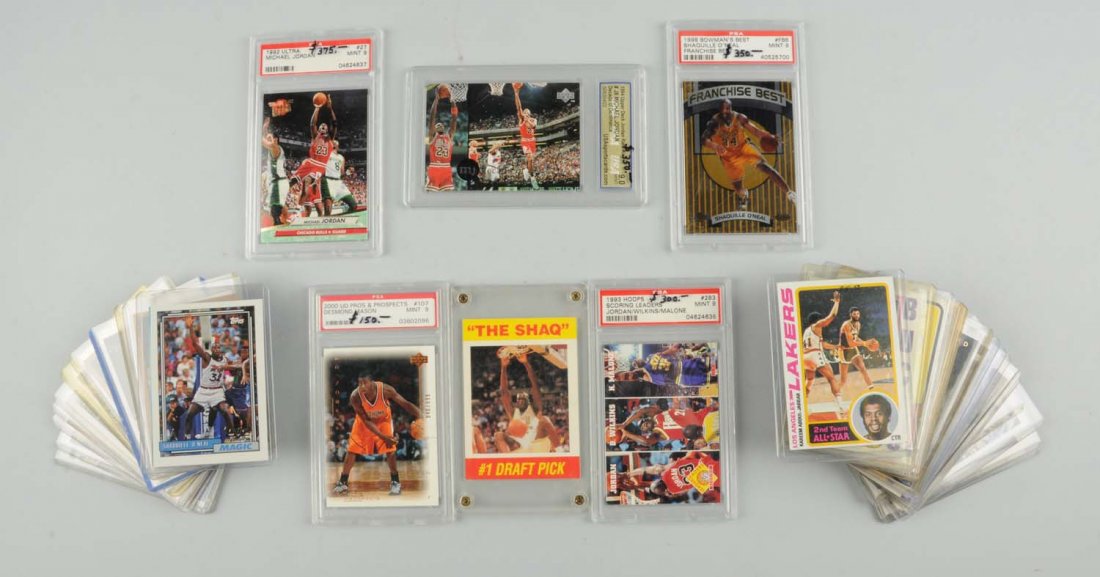 Lot Of 36: 1970's-Present Basketball Cards.: Includes five 1970's cards including 1972-73 Topps Julias Irving. There are four cards graded by PSA including one Michael Jordan. 23 various Shaquille O'Neal cards, including several rookie cards. Th