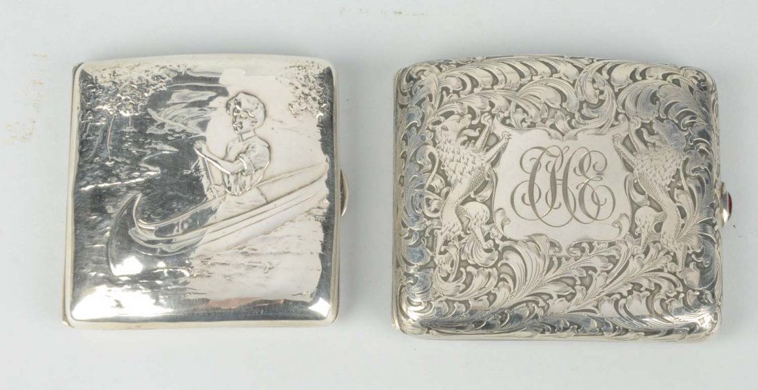 Lot Of 2: Sterling Silver Cigarette Cases.: One depicts wolves and is by Black, Starr, & Frost, and the other depicts a lady rowing a canoe. Condition (Excellent). Size 3" L.