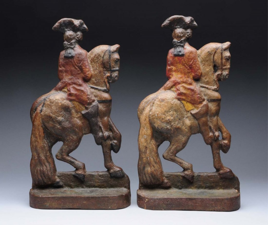 Cast Iron Pair Of Lafayette On Horses Doorstops.: A wonderful matching pair of doorstops with Lafayette on horseback, used on large French doors. Very early casting. Condition (Very Good). Size 15 - 3/8" T. x 8 - 3/8" W.