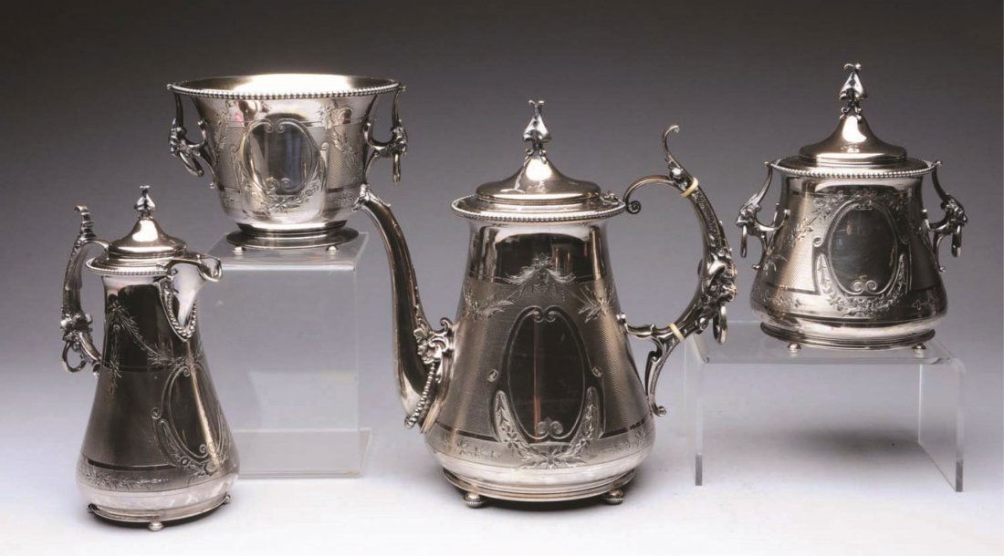 Gorham 4- Piece Coin Silver Tea Set.: retailed by J W Tucker & Co., San Francisco, comprising a teapot, covered milk jug, covered sugar bowl and waste bowl, each with a tapering body with engine-turned decoration and an oval reserve, the