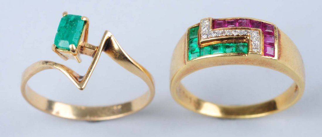 Lot Of 2: Gold Rings.: Emerald cut, size 7-1/2, 18K stamped, emerald natural or synthetic, heavy inclusion and chips. Ring is likely ruby, emerald, and diamond, size 7-3/4, stamped 750. Total weight 3.85 dwt for lot. Condit