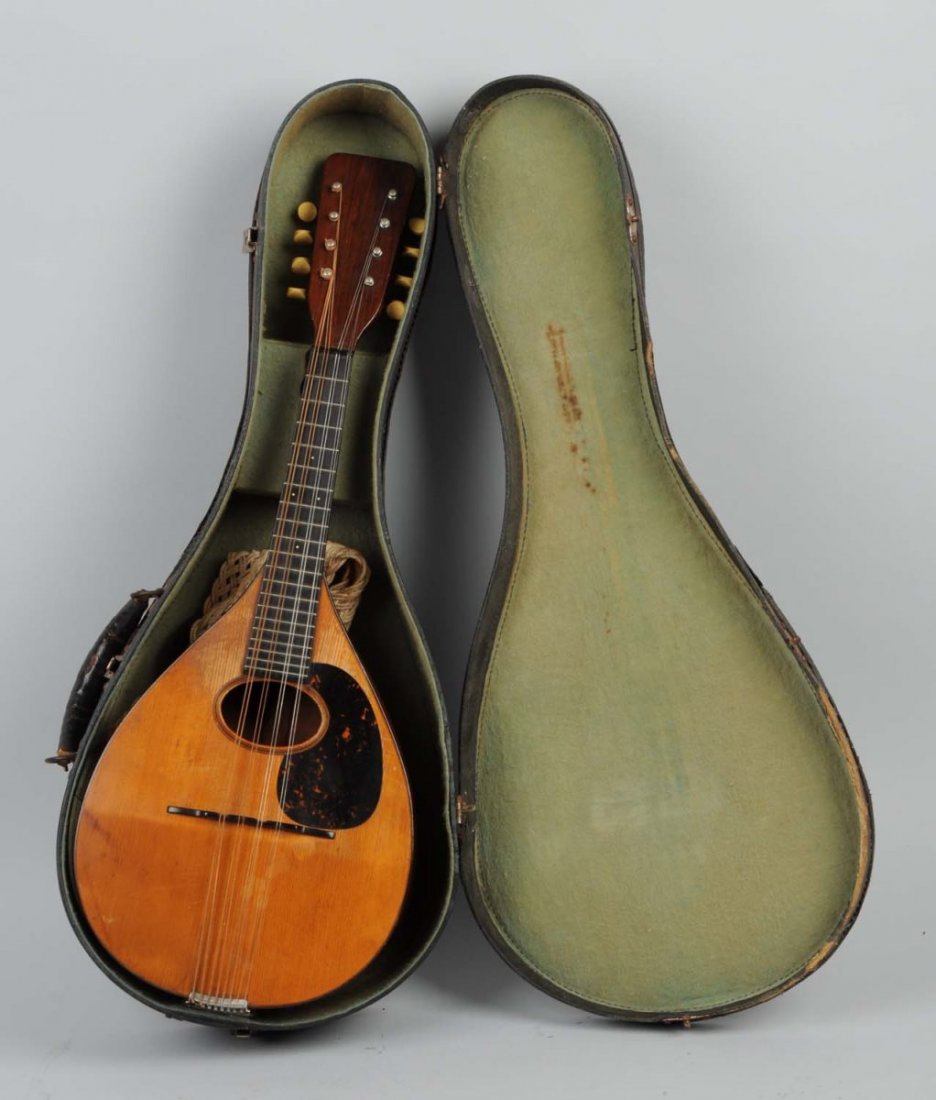 C.F. Martin & Co. Mandolin in Original Case.: Plays well, appears complete. Condition (Excellent). Size 26 -1/4" L.