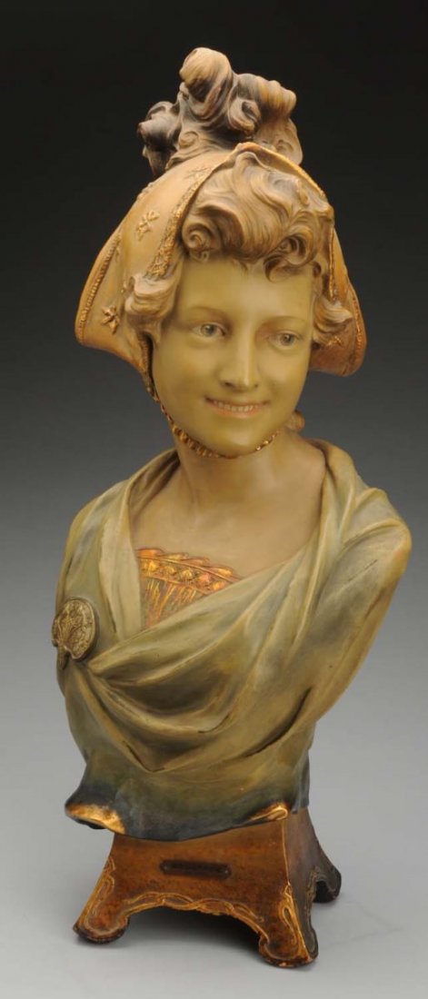 Belgrade Large Terracotta Bust.: Of a woman cloaked in a wavy roll with floral broach and kerchief around her head. Smiling. French. Artist signed on the back with the foundry mark of Fontaine and Durieux Paris. Condition (Near Mint)