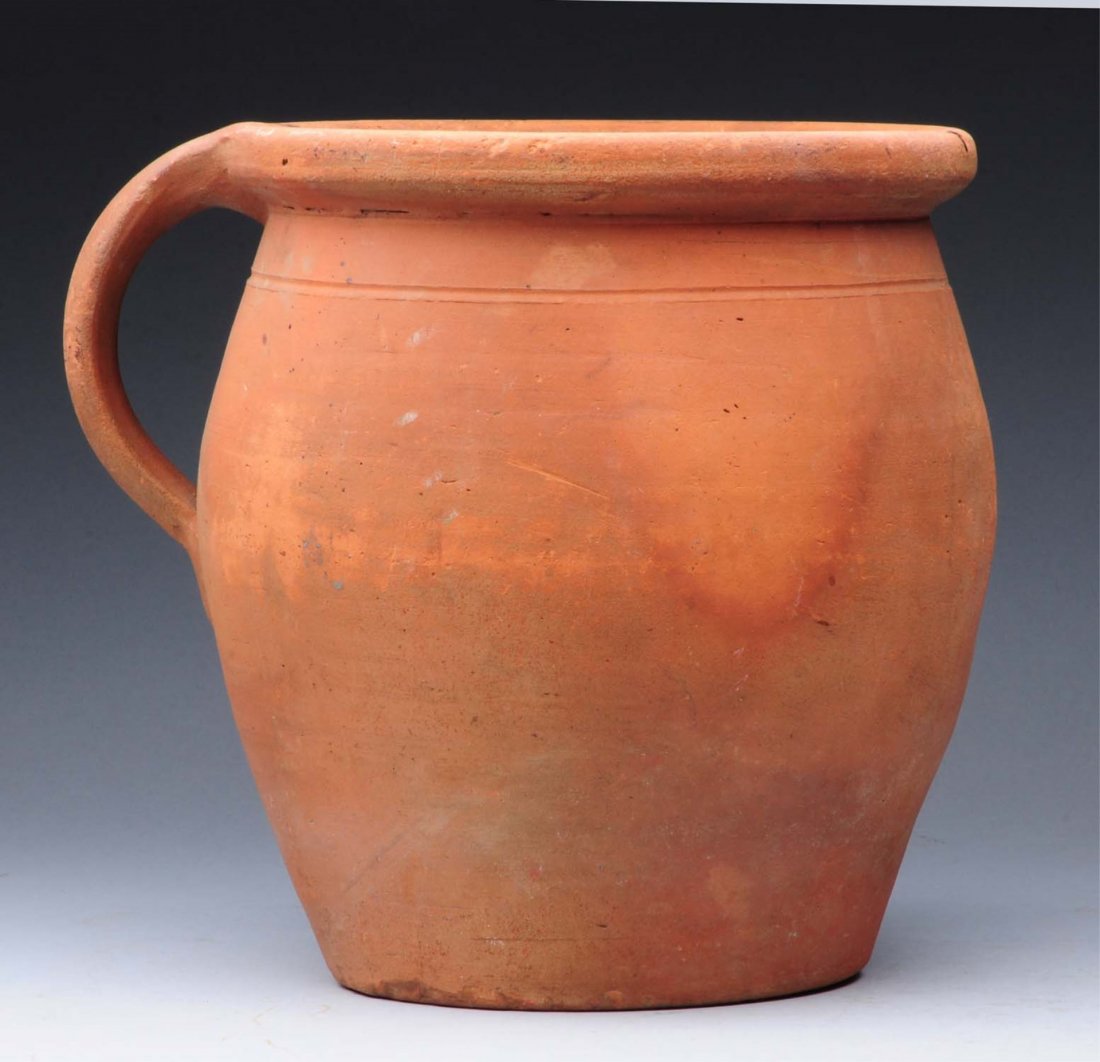 Redware PA Apple Butter/Milk Pot.: Circa 1840. One rim chip, otherwise no cracks. Condition (Excellent). Size 8 - 1/4" T.