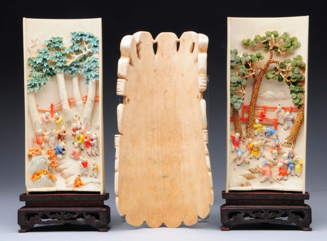 Lot Of 3: Ivory Pieces.: This lot includes two ivory panels with tree motifs and a carved ivory mask. Some cracking to the mask. Condition (Very Good Plus). Size Largest :8 -1/2" L.