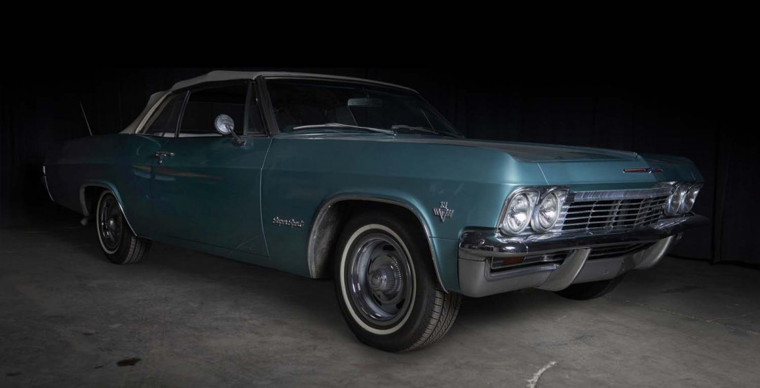 1965 Chevy Impala SS Convertible.: In 1965 the Chevy Impala was totally redesigned with an “X” frame full width perimeter frame. Styled with fenders similar to the Corvette, the new body featured curved, frameless side glass, sharp