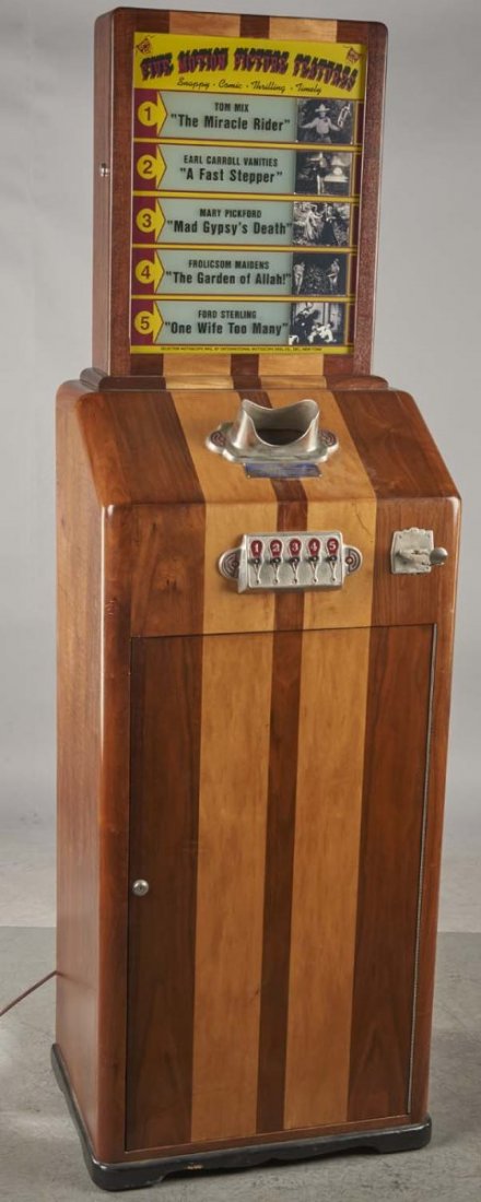 5 ¢ Selector Mutoscope Picture Machine: Nickel machine offers viewers five selections: The Miracle Rider, A Fast Stepper, Mad Gypsy's Death, The Garden of Allah, and One Wife too Many. Manufactured by International Mutoscope Reel Co. Includ